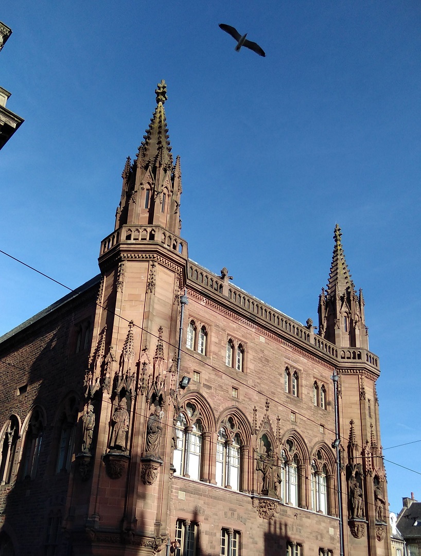 The facade of the Portrait Gallery with towers and statues