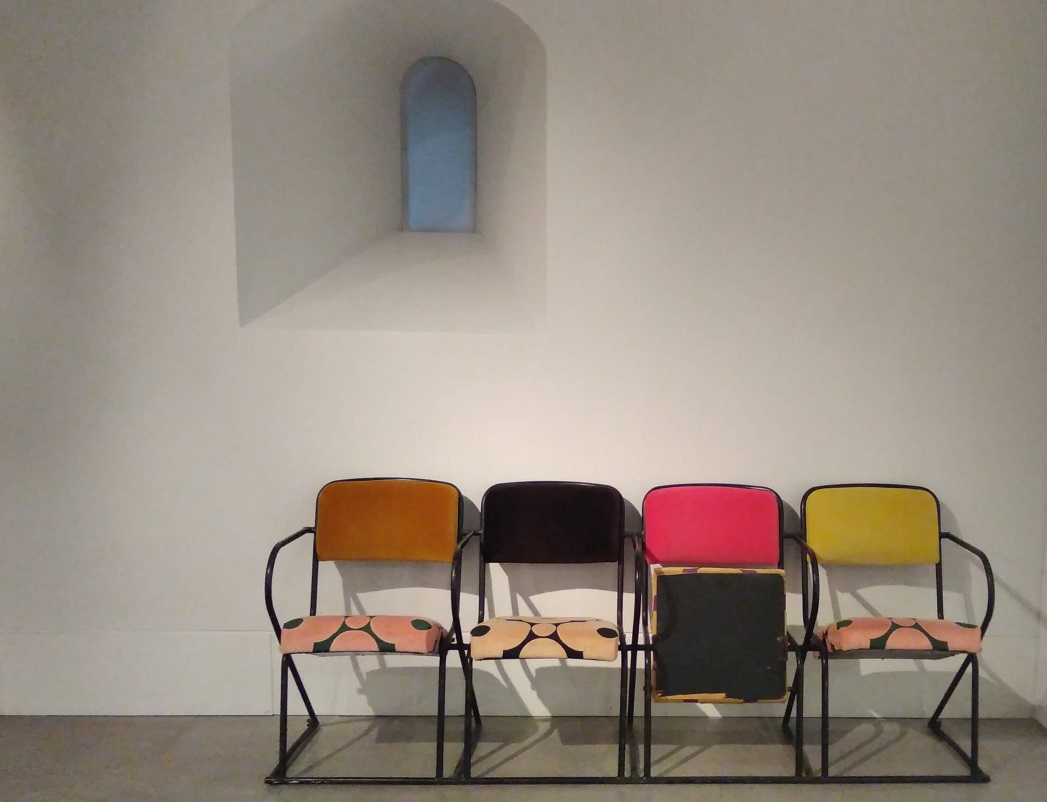 A row of 4 chairs with Orla Kiely fabric