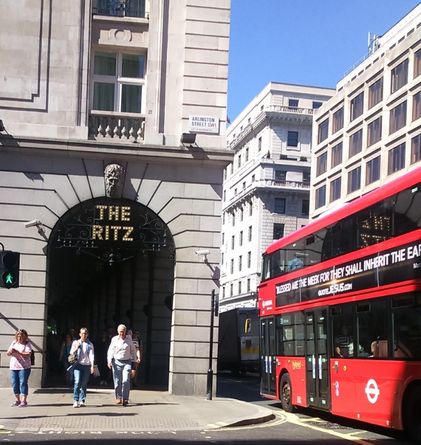The Ritz hotal and a red London bus in the same shot.