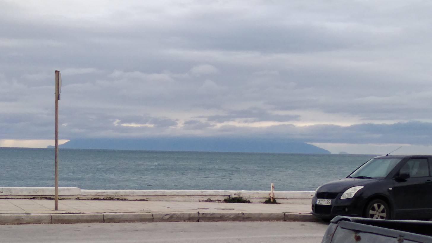 A ckoudy day with the base of the island of Samosthraki, Greece
