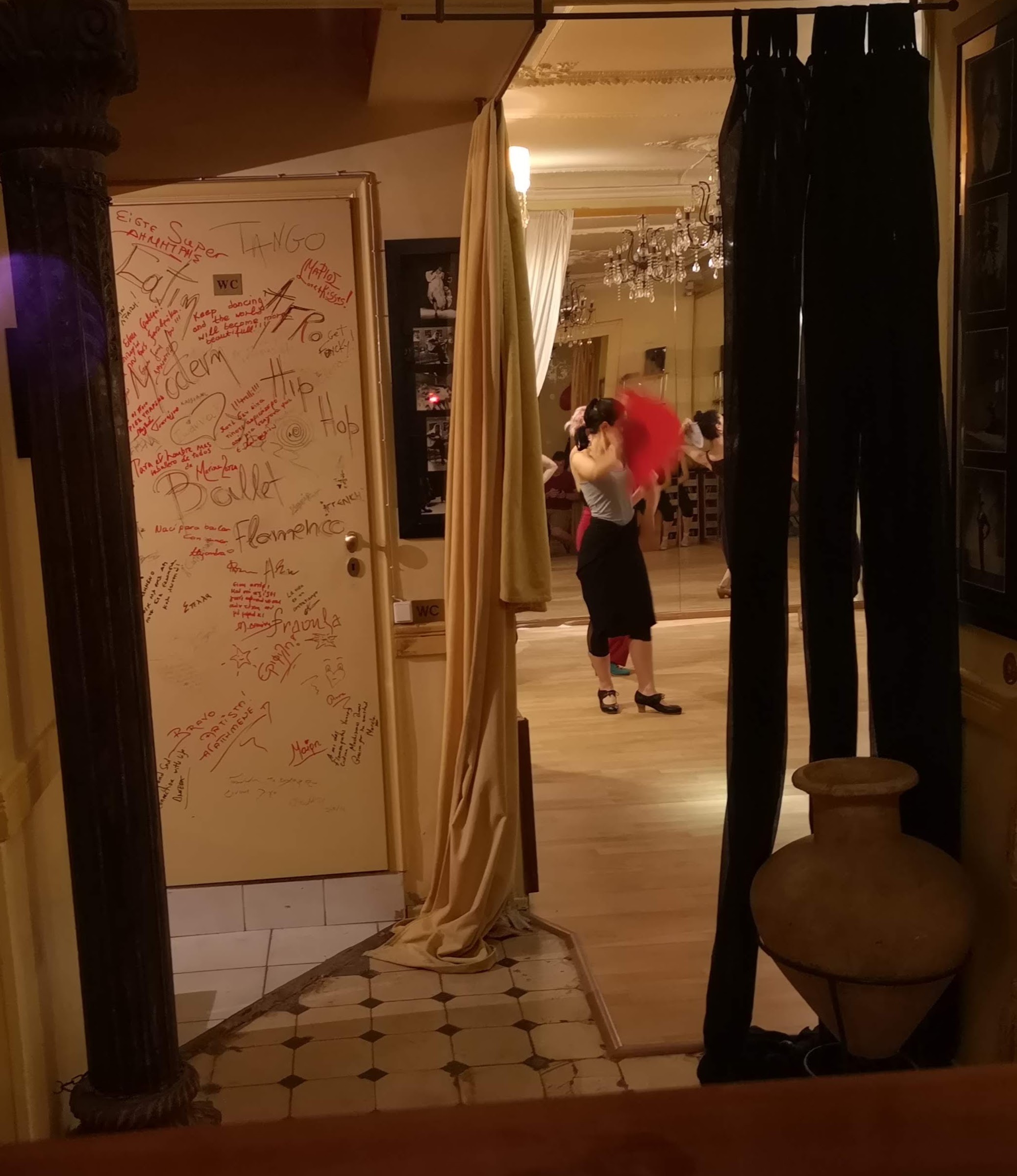 Flamenco dancer with red fan and Greek urn