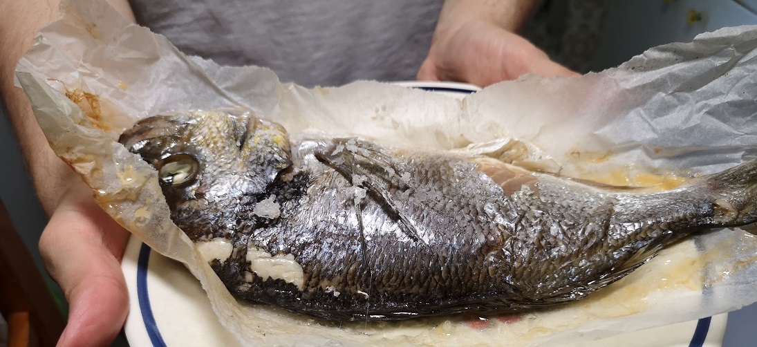 Cooked fish with head and tail