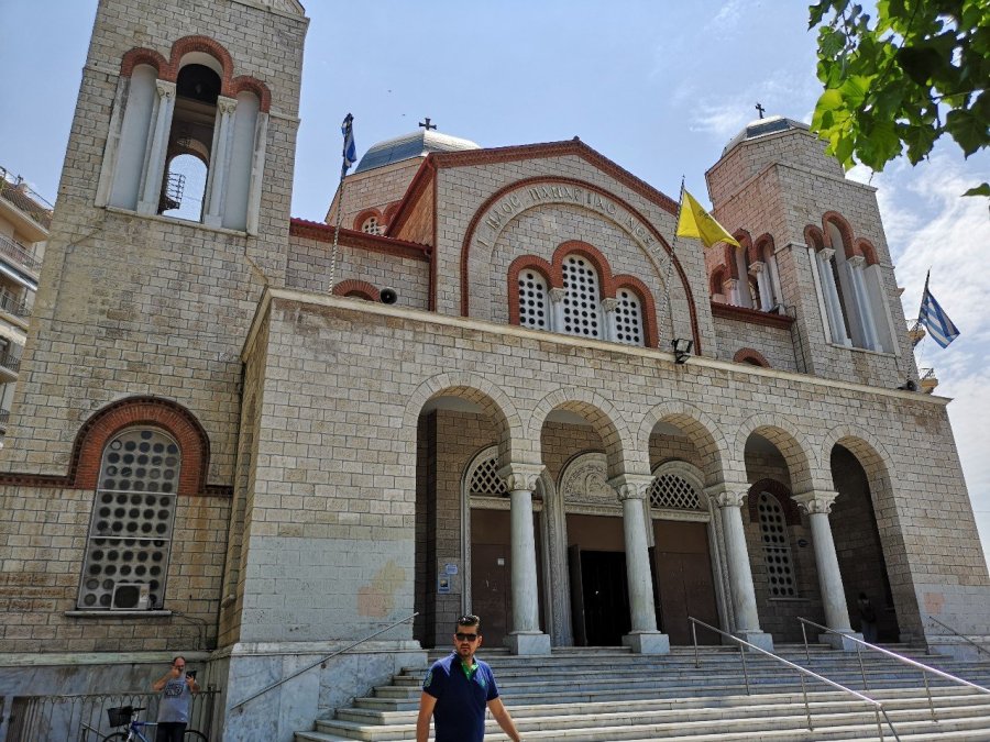 White fluted uprights above flight of steps 
