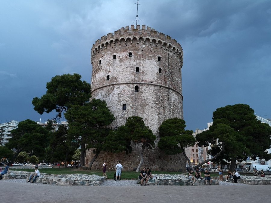 A round old stone building by the sea 