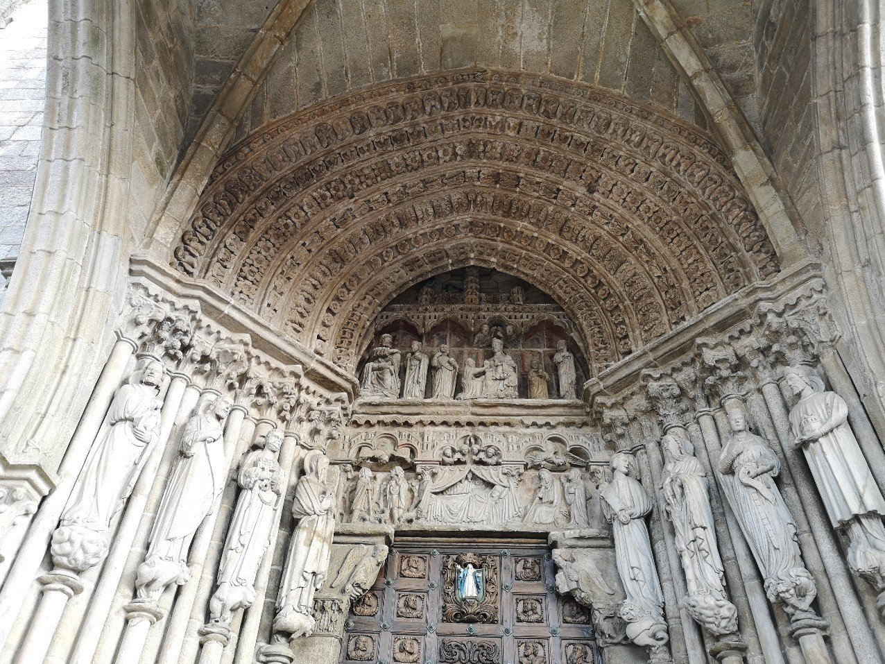 detail statuary carving ancient stone portal cathedral Tui