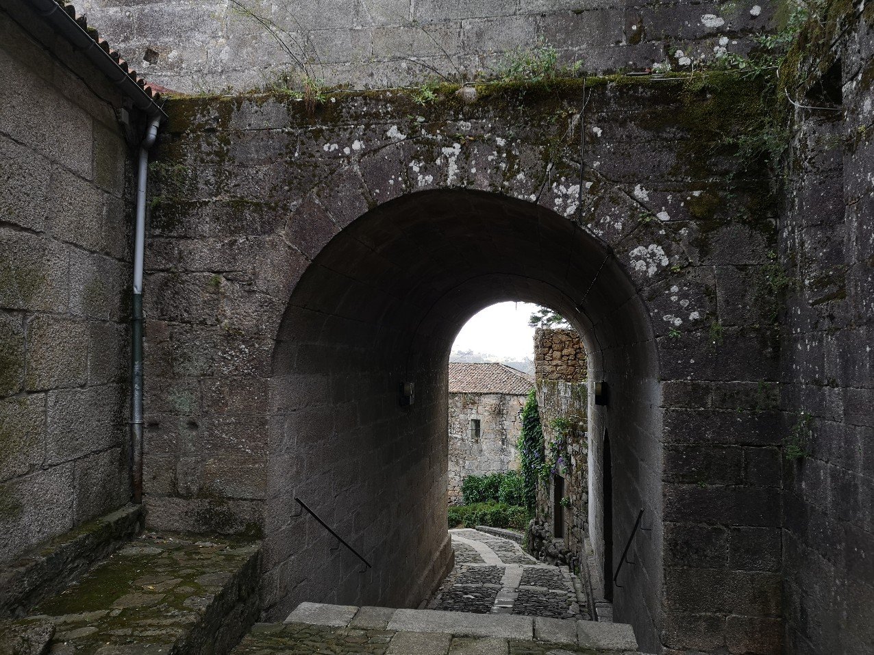 Roman and Medieval architecture cobbled street ancient arch